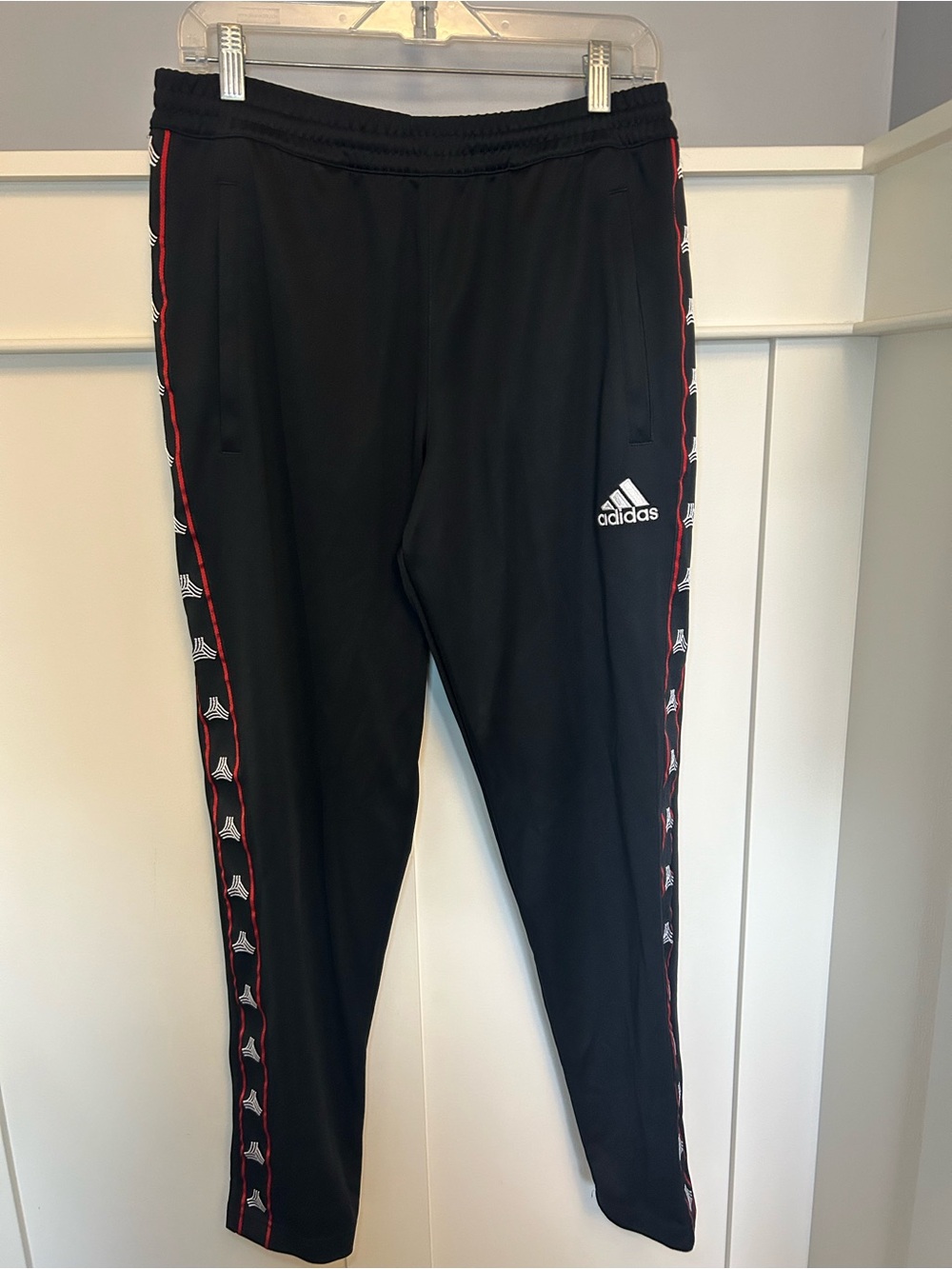 Adidas tapered triangle logo track pants